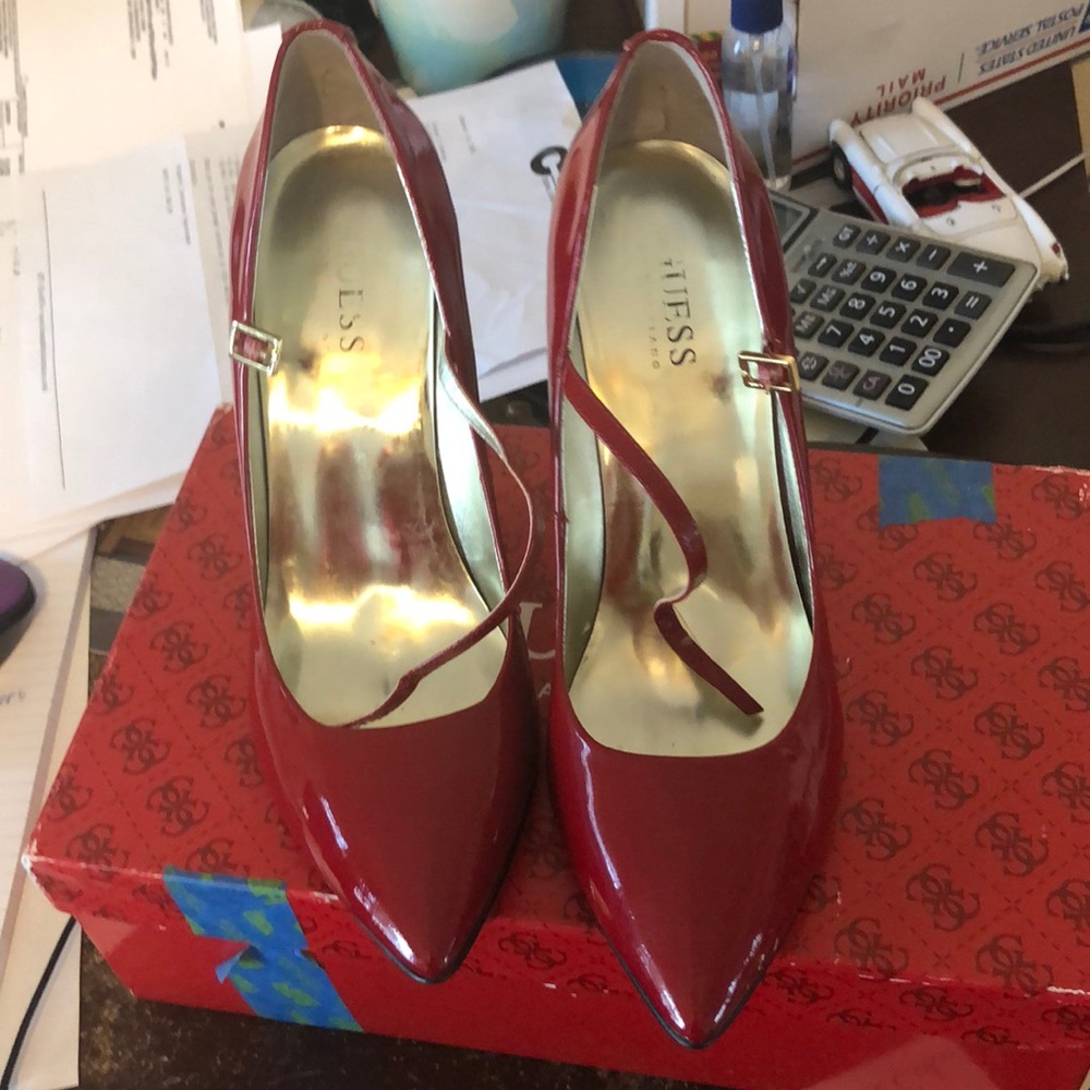 Red patent leather pumps